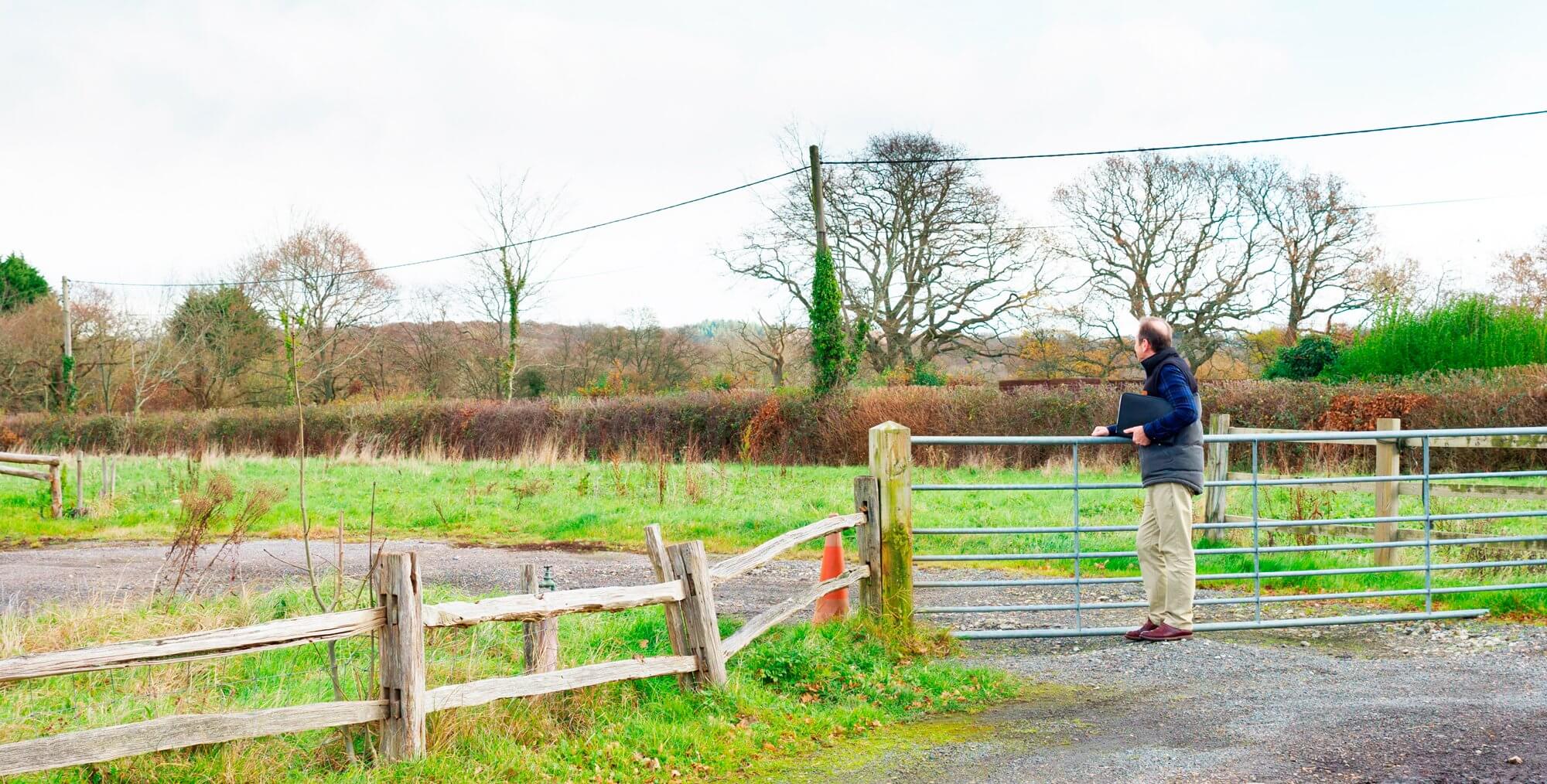 Mike Dade looking at two plots with planning permission