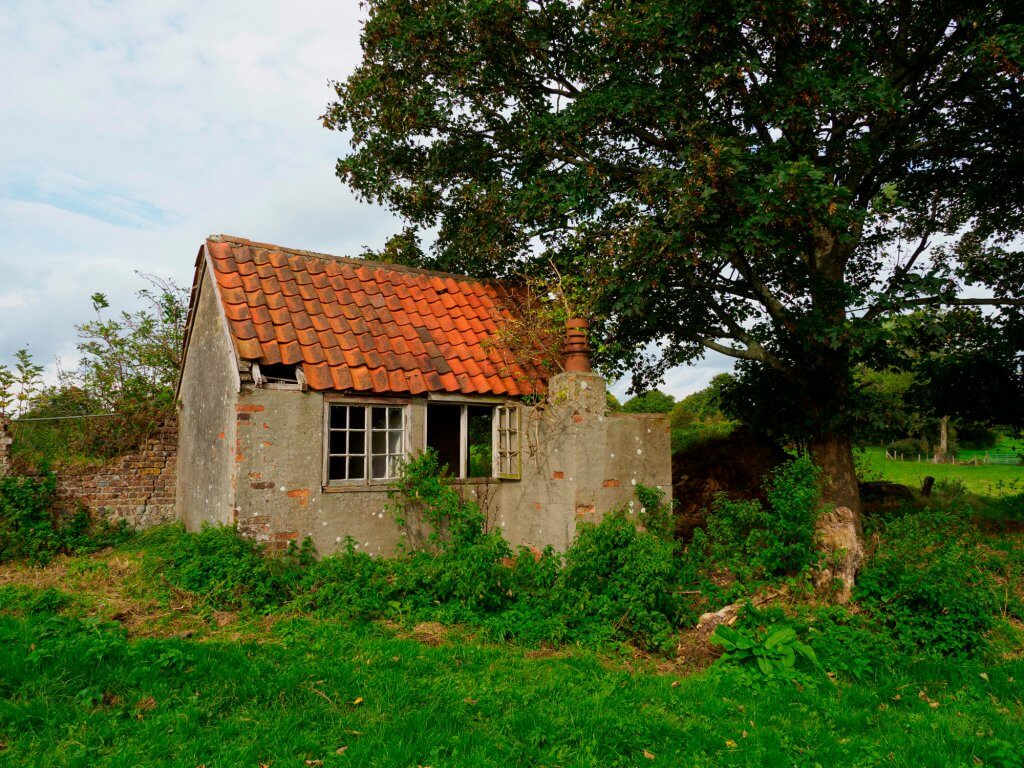 Rural plot in Kent with rundown structure