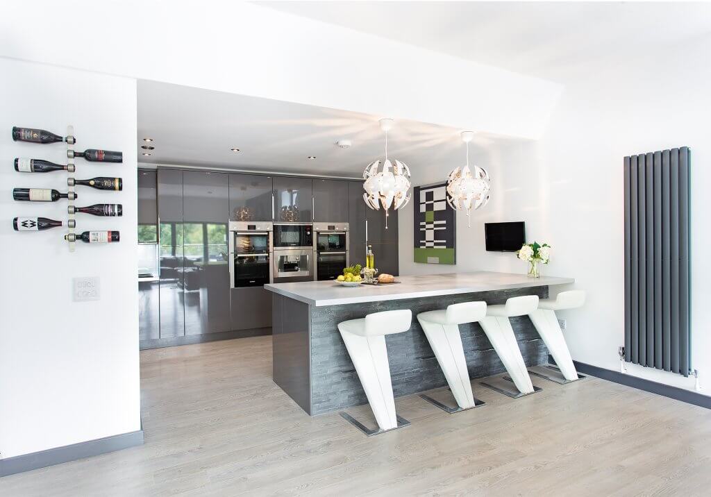 Kitchen and island with seats