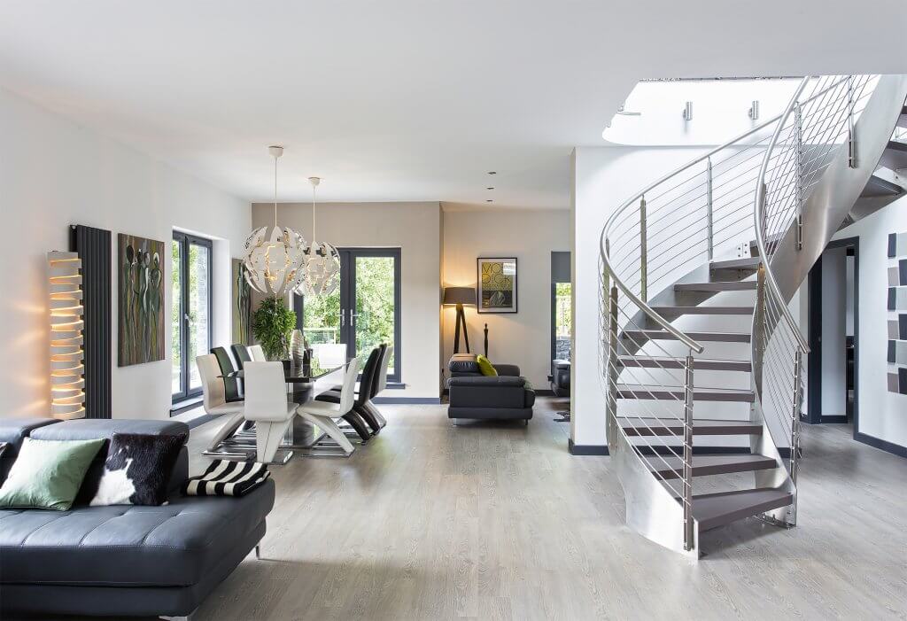 Large living area with steel staircase