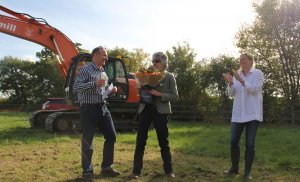 Self builders from custom build development in Norfolk celebrating as groundworks start