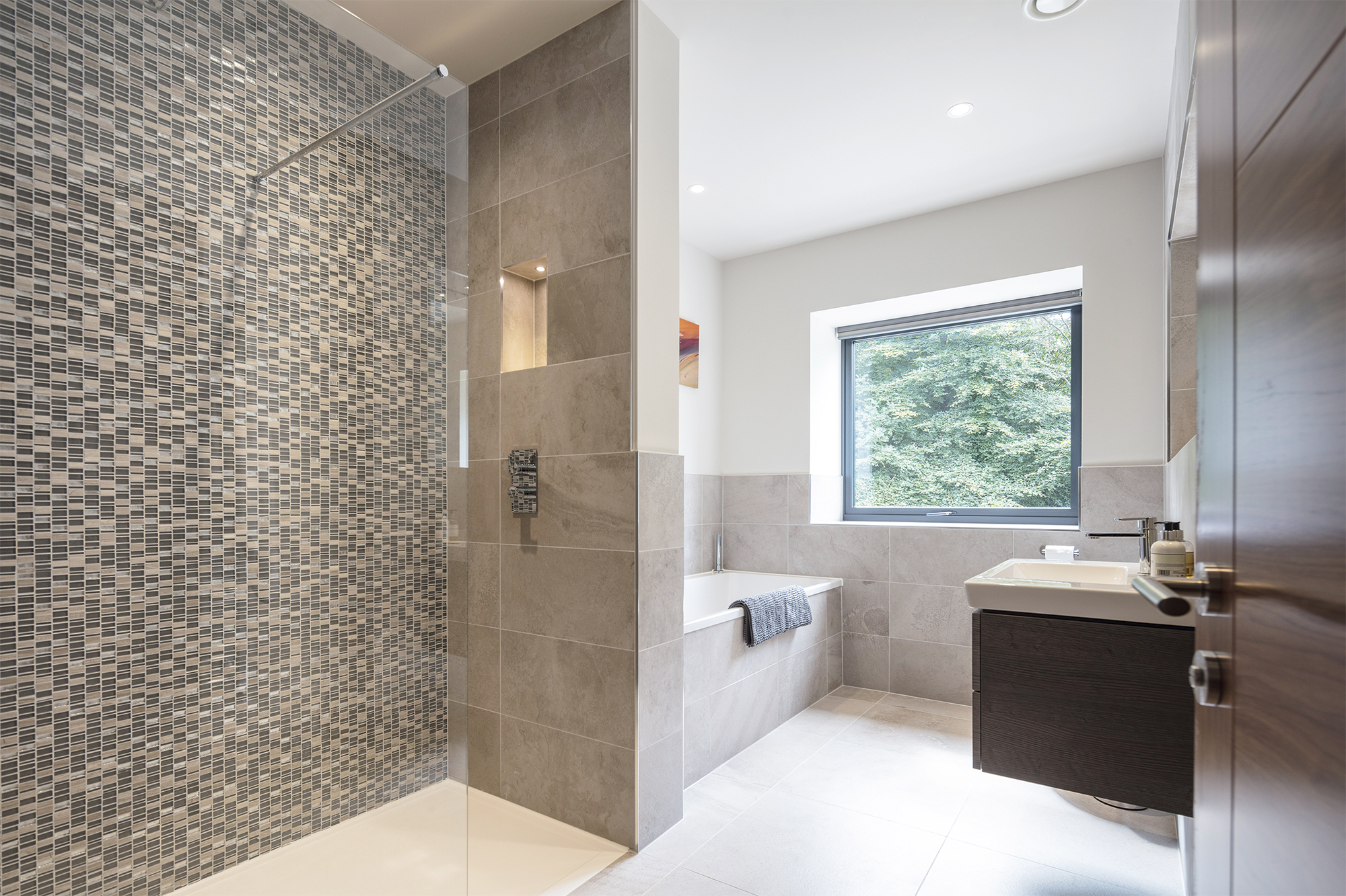 Bathroom with separate walk-in shower in fully integrated smart home