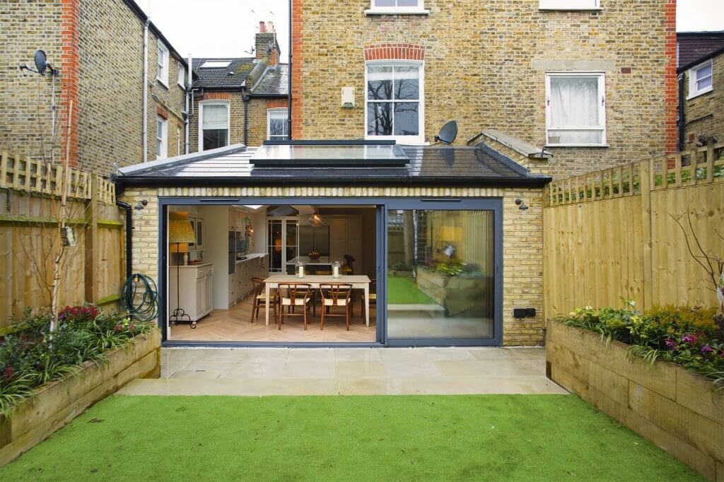 Wraparound extension with large sliding doors