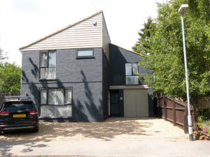 Modernist home facade after undergoing a renovation