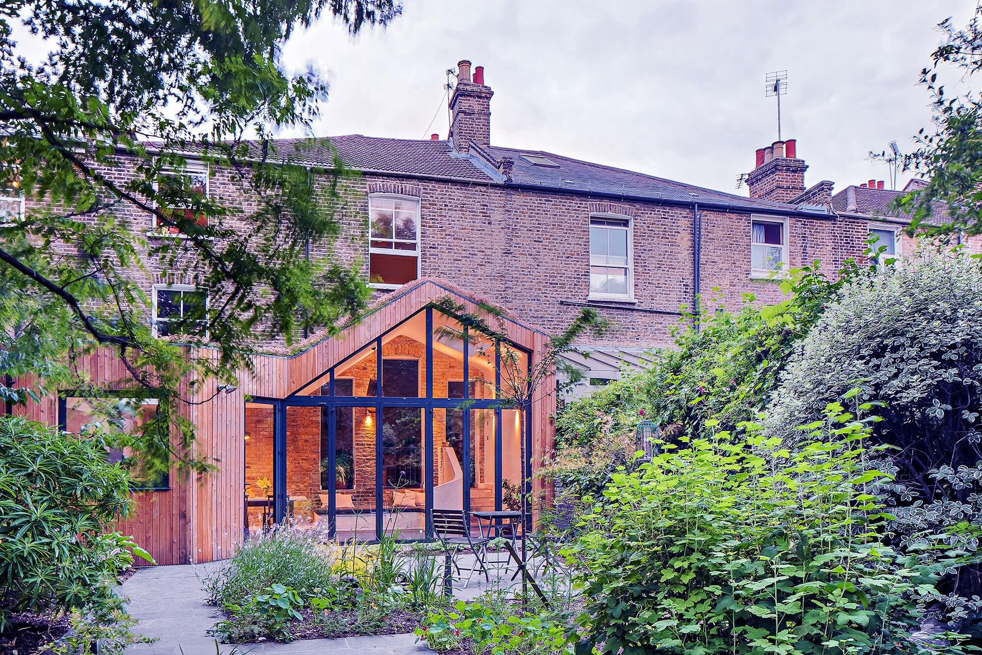 Timber clad extension glazed gable to Victorian terrace