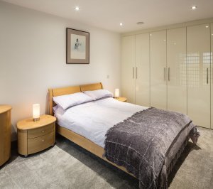 Bedroom in timber frame home