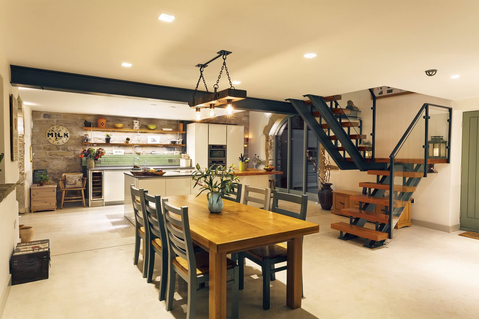 Kitchen-dining room featuring pendants and recessed downlights