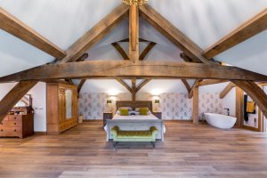 bedroom in oak frame home