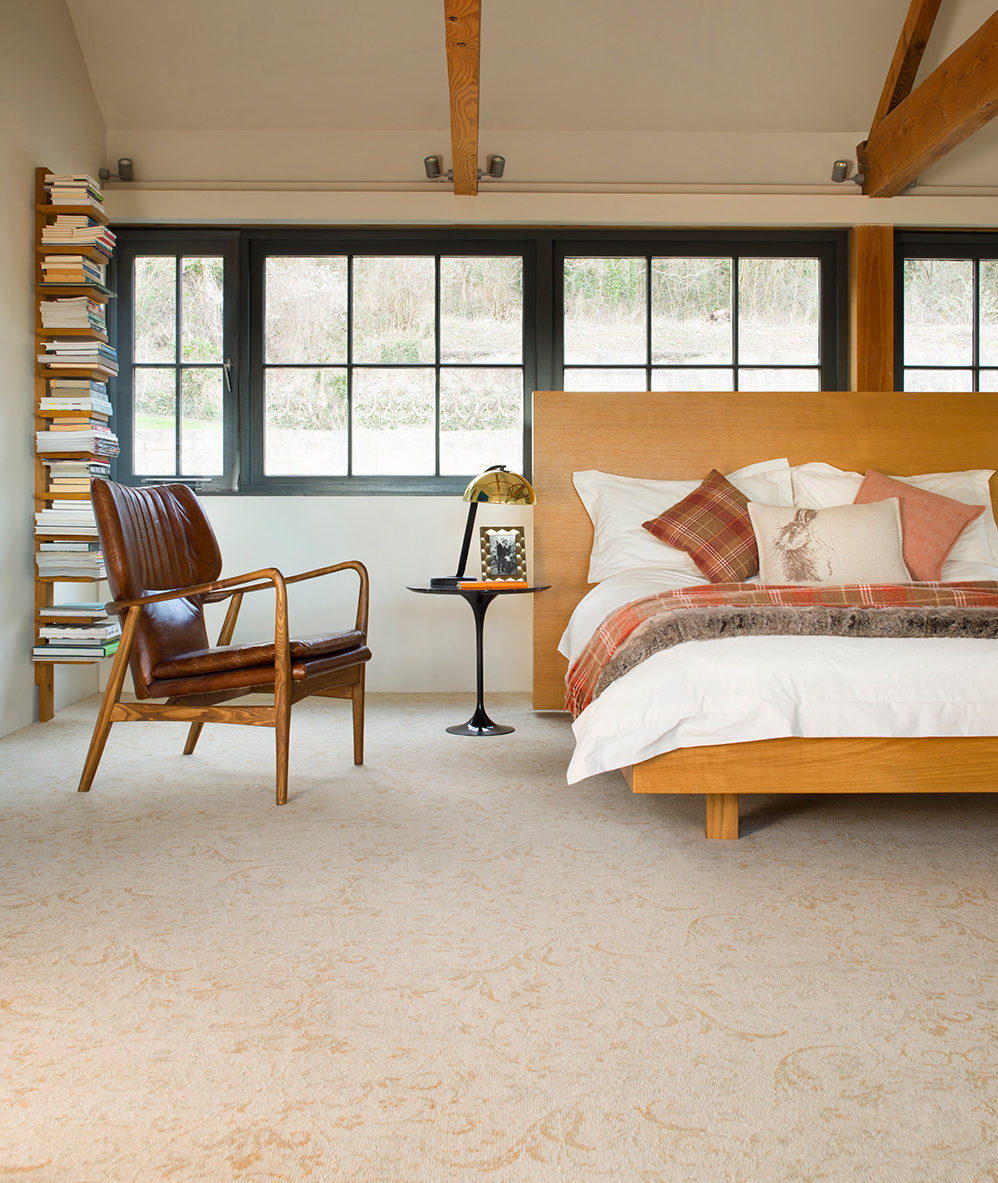 Bedroom with carpeted floor
