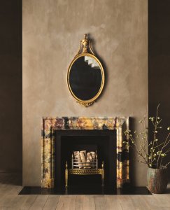 Period style fire place with patterned marble