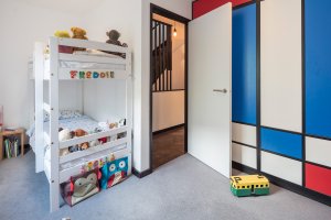 Children's bedroom with colourful wardrobe