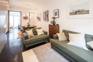 Open plan living room connected to dining space