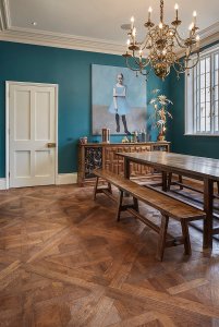 Traditional dining room with wood flooring