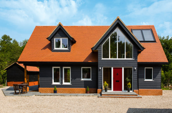 Barn style home clad in black timber