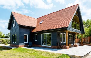 Barn style home clad in black timber