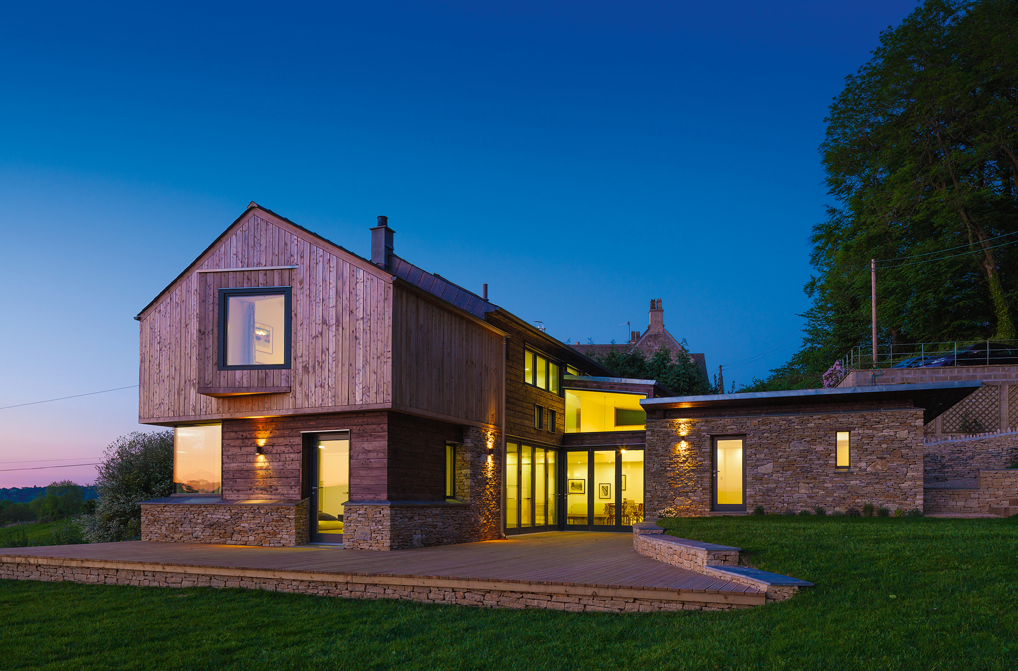 Timber frame home with cantilevered gable