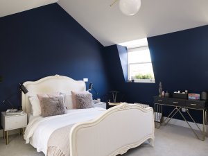 Bedroom in mansard loft conversion in Victorian terrace home