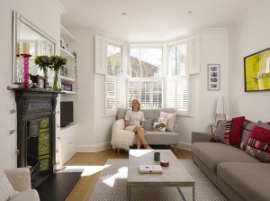 Helen Brown sitting in her living room