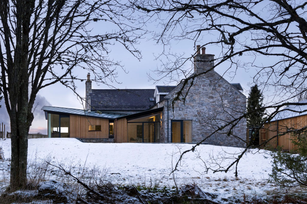 Stone cottage with Siberian larch cladding