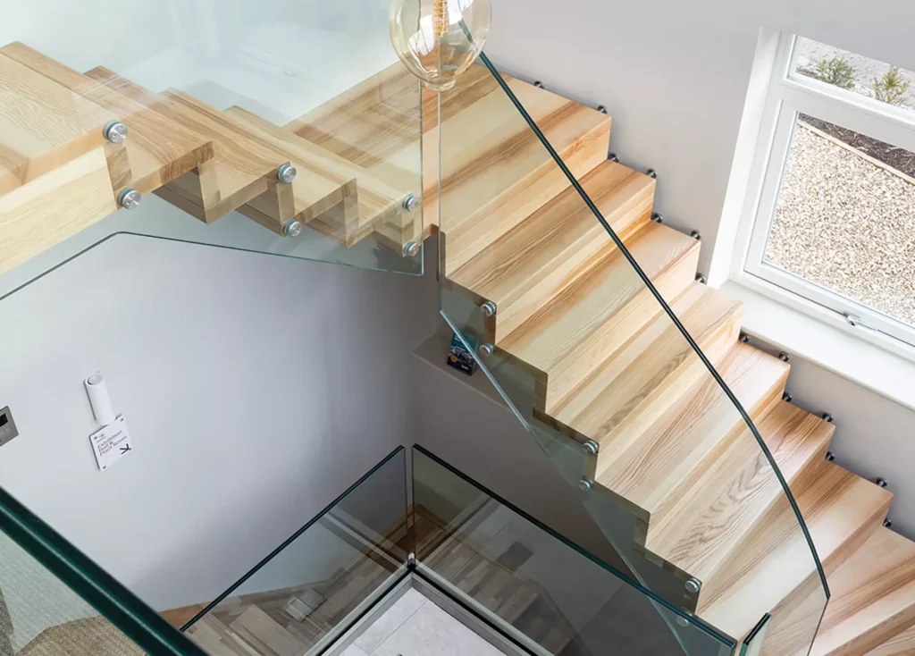 contemporary staircase with glass balustrade