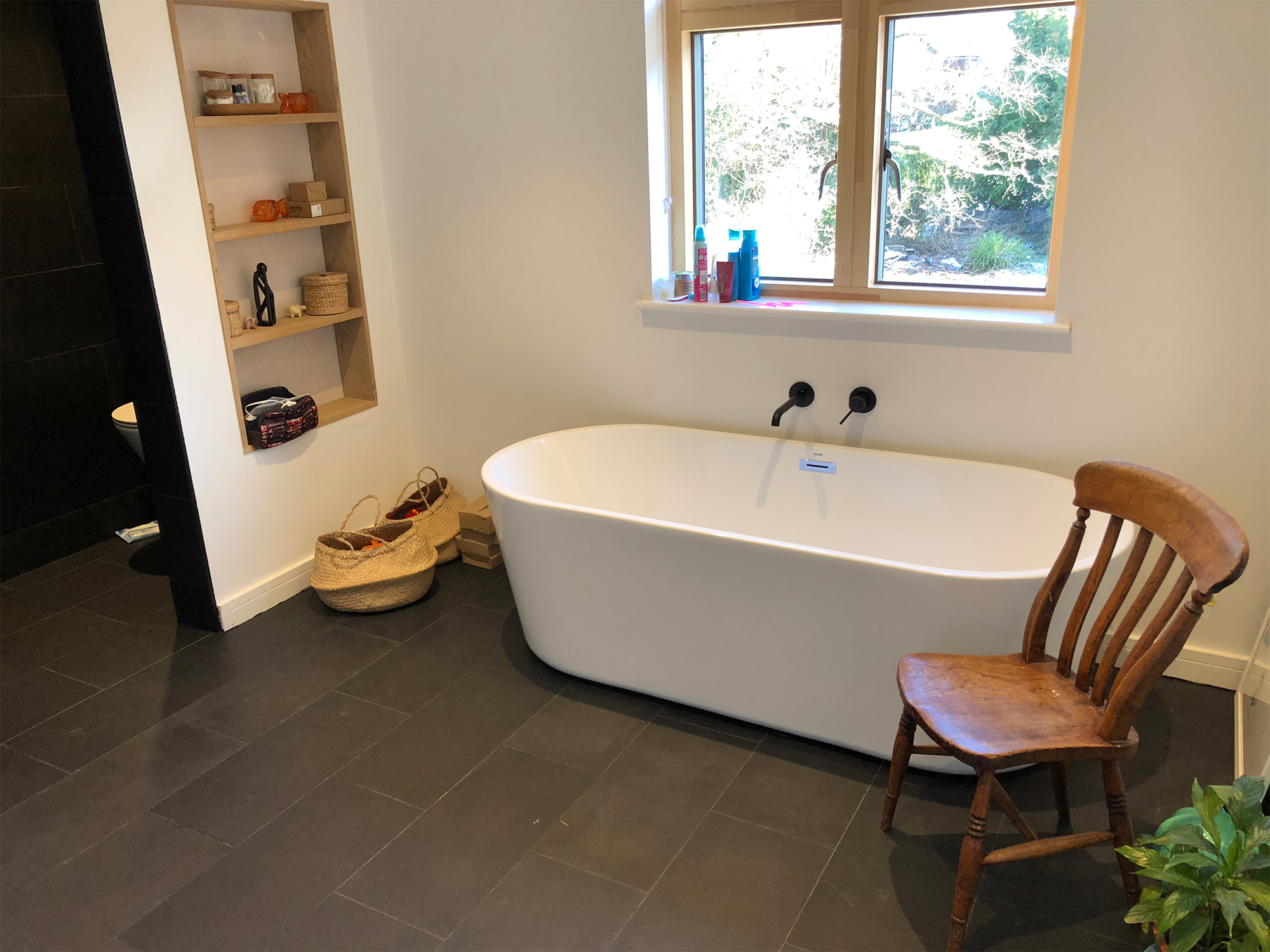 Bathroom with free standing tuib