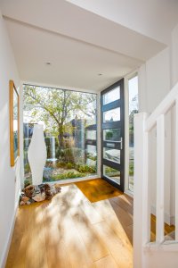 Front door with structural glazing