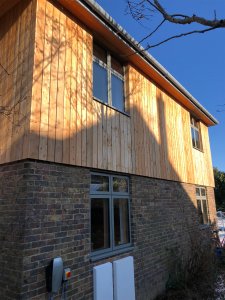 Timber cladding and bricks