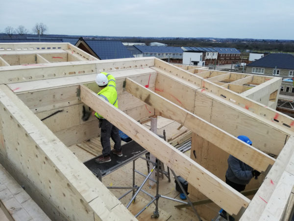 Facit Homes erecting the timber frame at Graven Hill Site