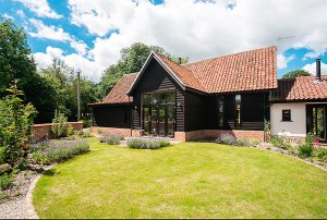 Barn conversion with dark cladding