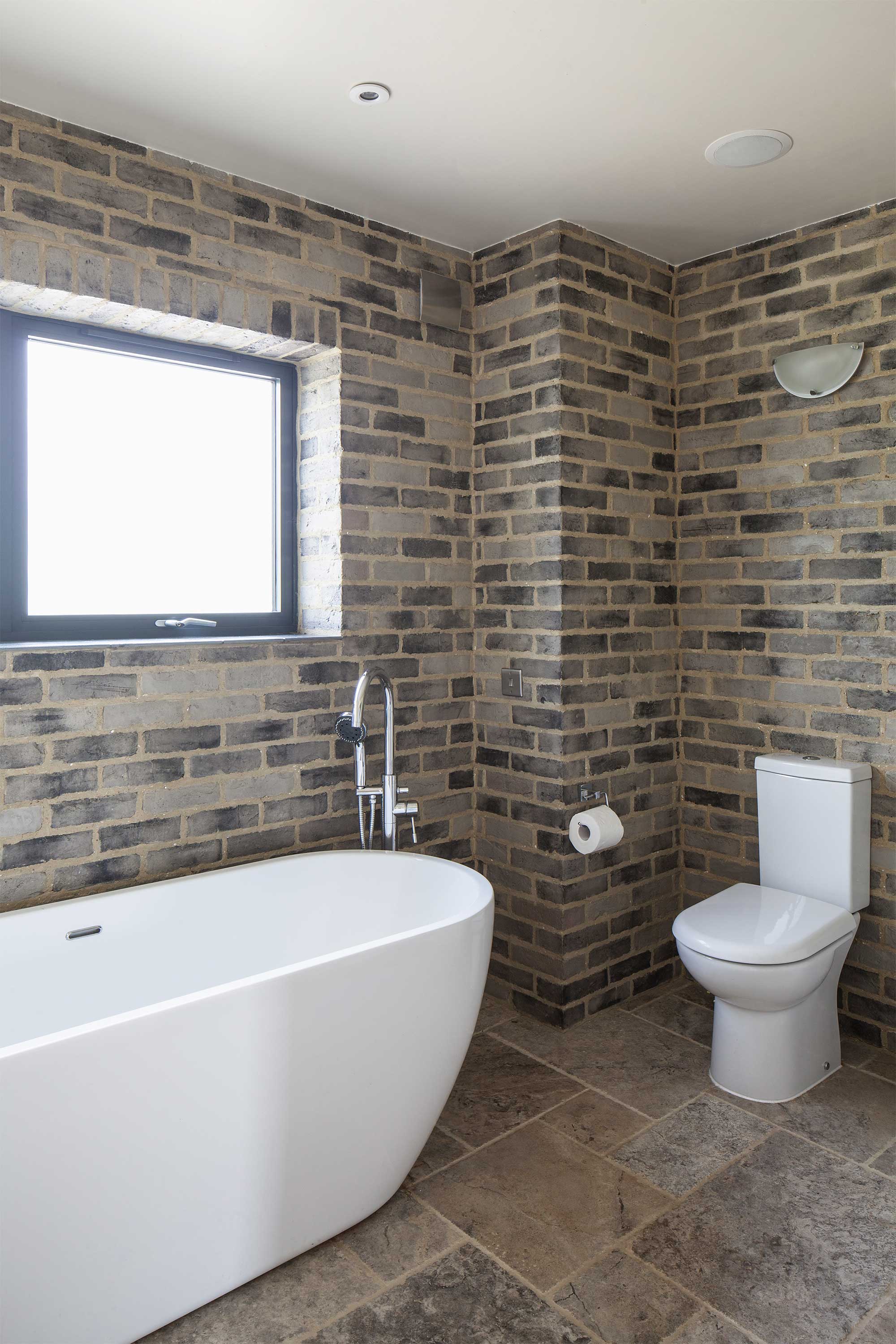 Bathroom with stone tiles