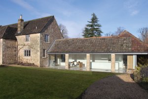 cow byre conversion featuring large expanses of glass