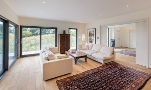 Living room with floor-to-ceiling glazing