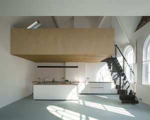 London methodist church conversion featuring a mezzanine in the kitchen