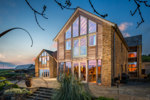 Glazed gable in oak frame farmhouse