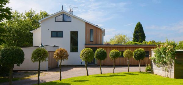 Home exterior with render and timber cladding