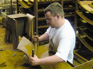 Man making clay tiles