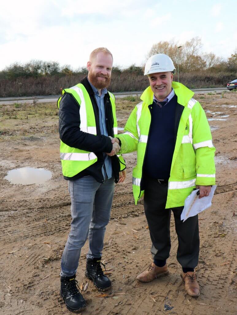 Build It editor Chris Bates and Graven Hill's Ralph Driver at the plot handover