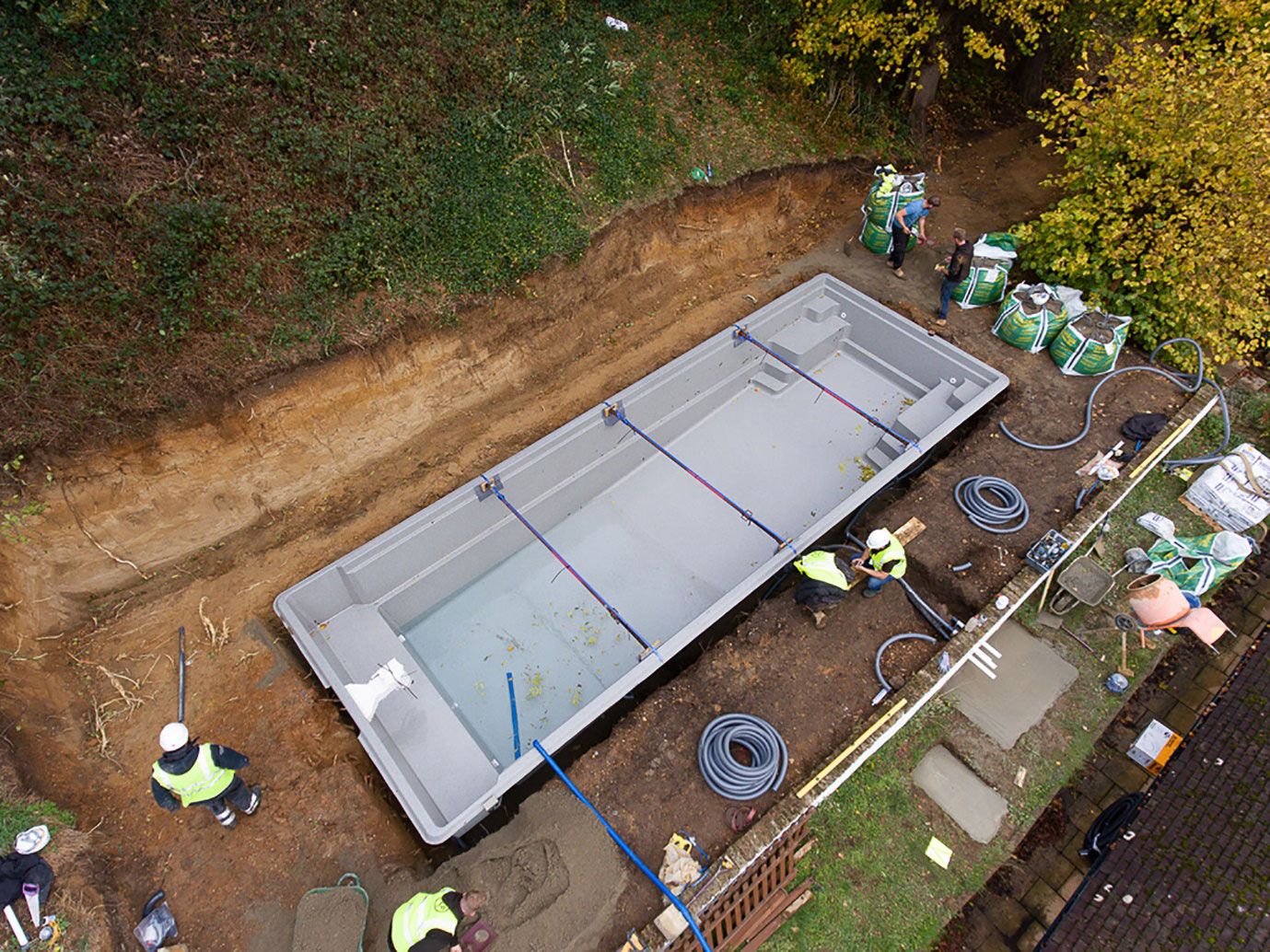 install pool in backyard