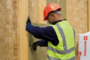 Man fixing wall