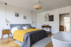 Master bedroom in stylish home