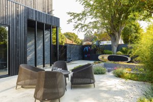 Contemporary home with paved courtyard