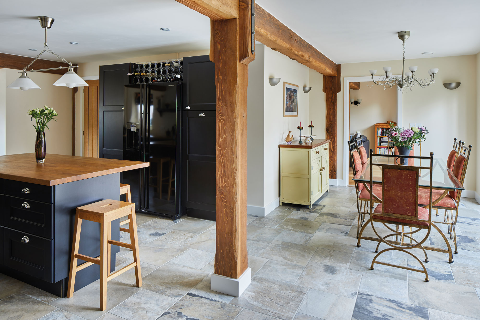 Open-plan kitchen-diner with exposed beams