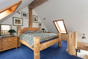 Rustic mezzanine bedroom