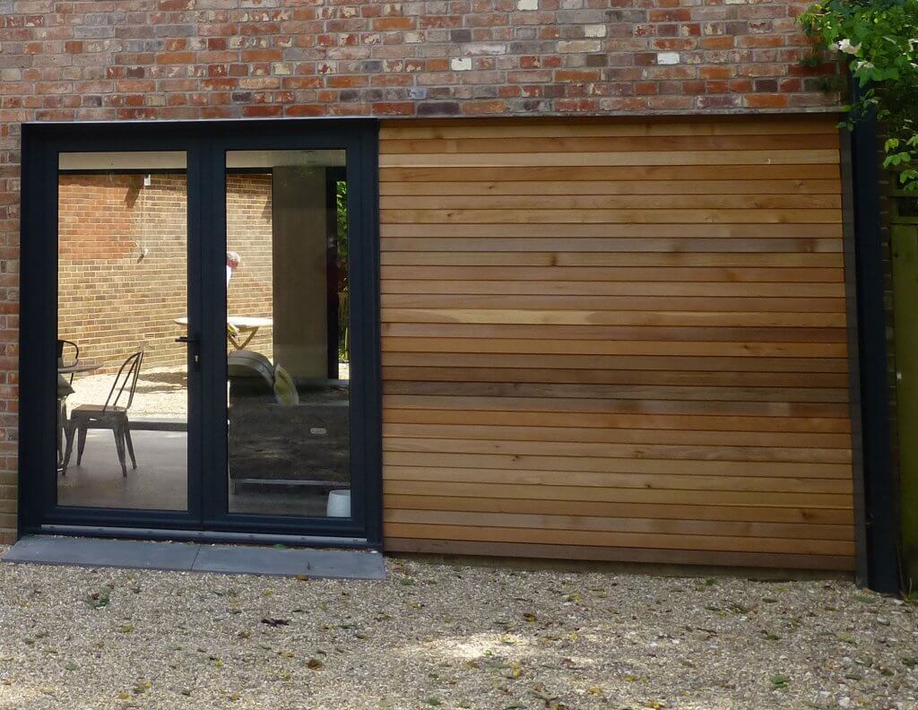 Cedar cladding and bifold doors