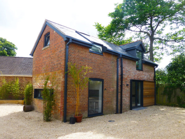 Exterior of renovated coach house in Hampshire