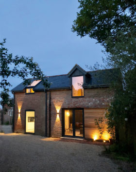 Coach house with cedar cladding