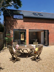 Courtyard area with table and chairs for outside living