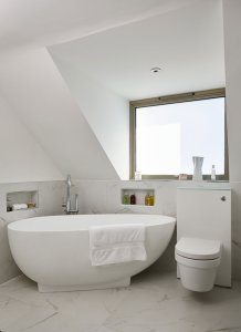 Freestanding bath in contemporary bathroom