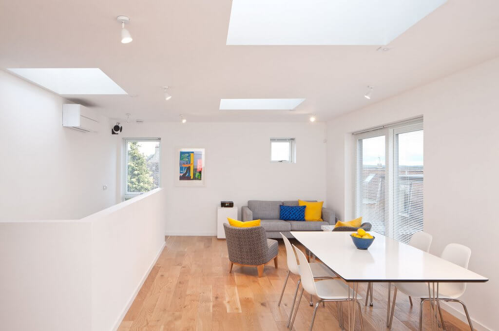 Open-plan living area with engineered wood flooring