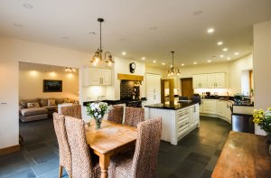 Large open-plan living-area with stone flooring